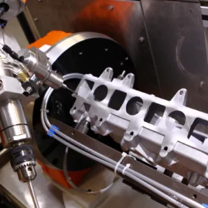 Robotic system for deburring and milling die-cast parts