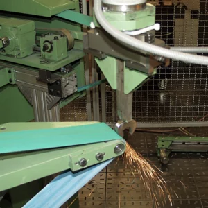 Edge and crown grinding of wrenches