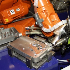 Robotic system for deburring die-cast and cast steel parts