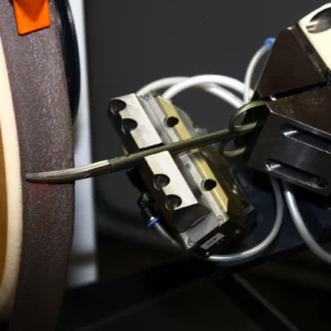 Faceted grinding of surgical scissors
